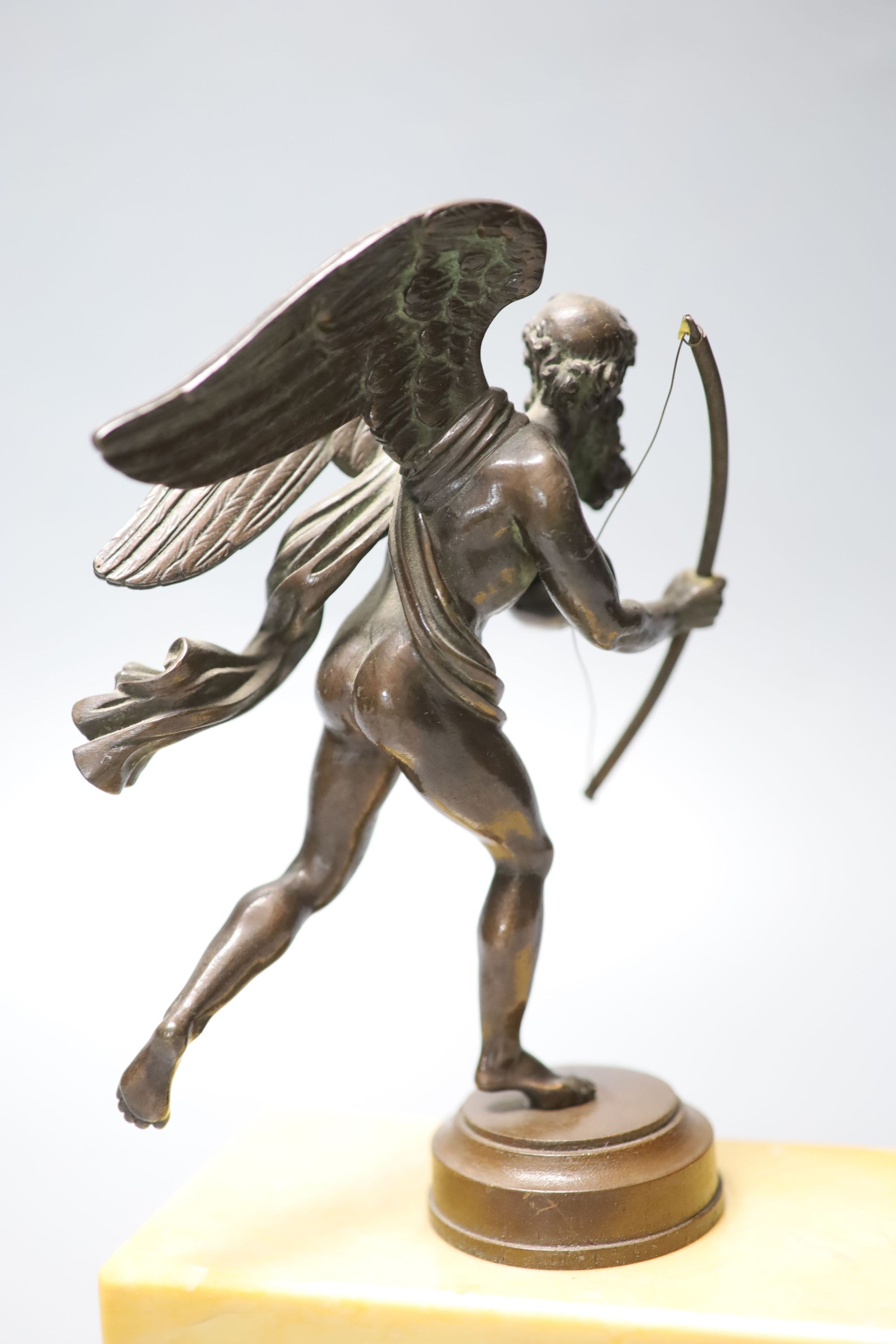 A neoclassical style bronze figure of Father Time, wood and marble plinth, 20cm high